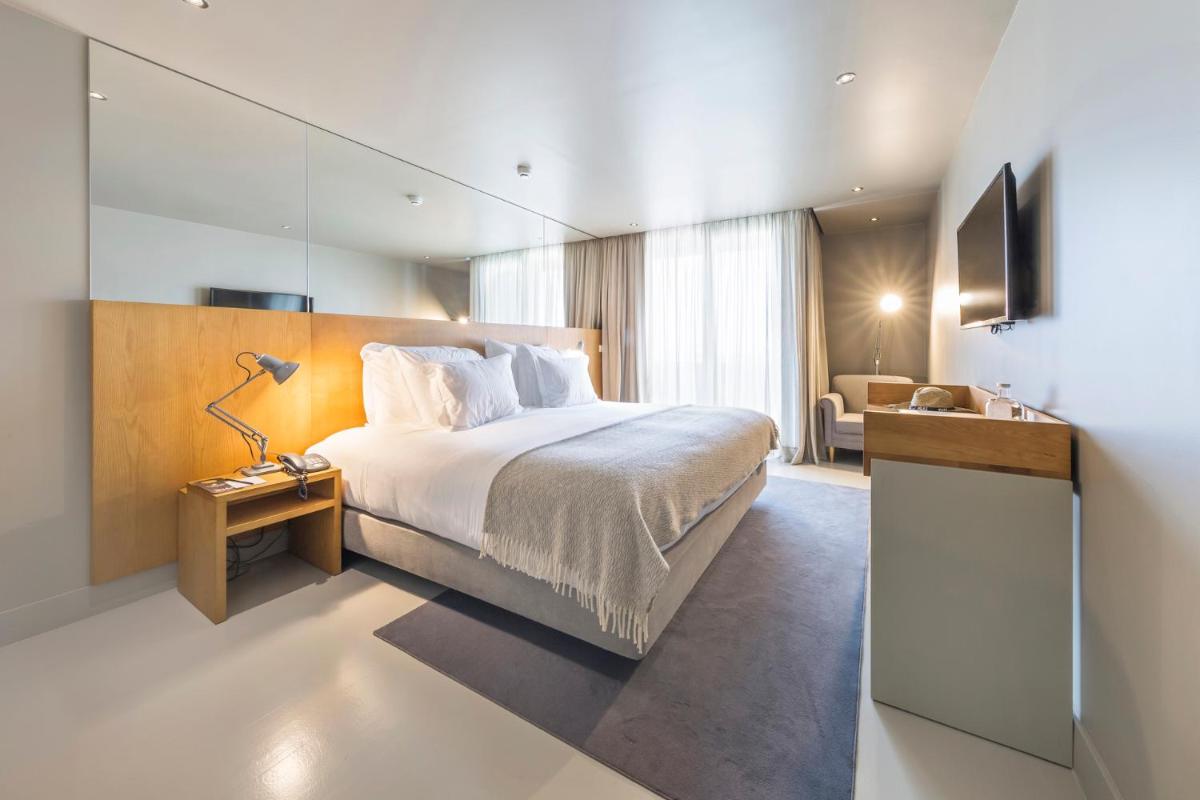 Uma cama ou camas num quarto em Villa C Boutique Hotel