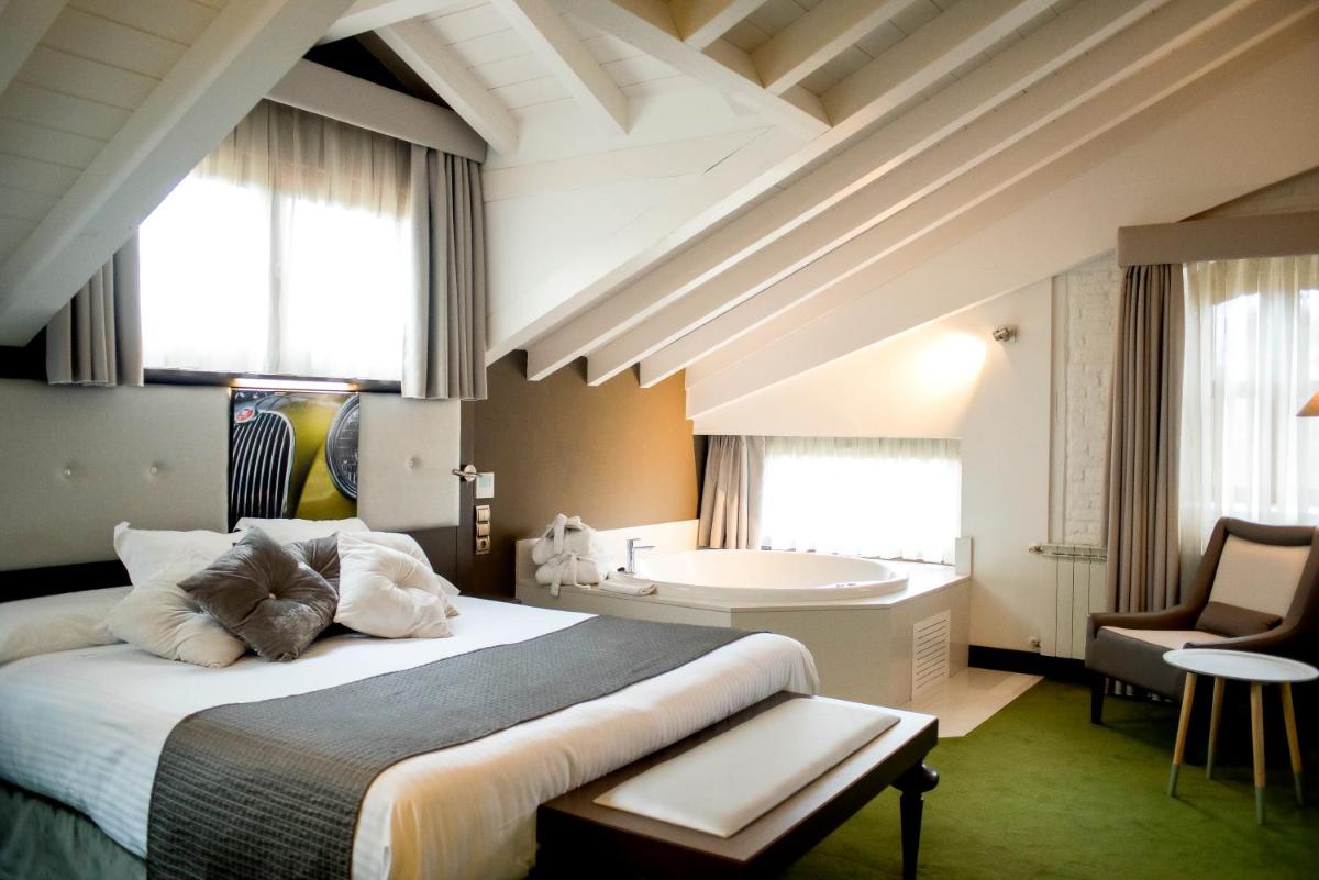 Cama o camas de una habitación en Costa Esmeralda Suites