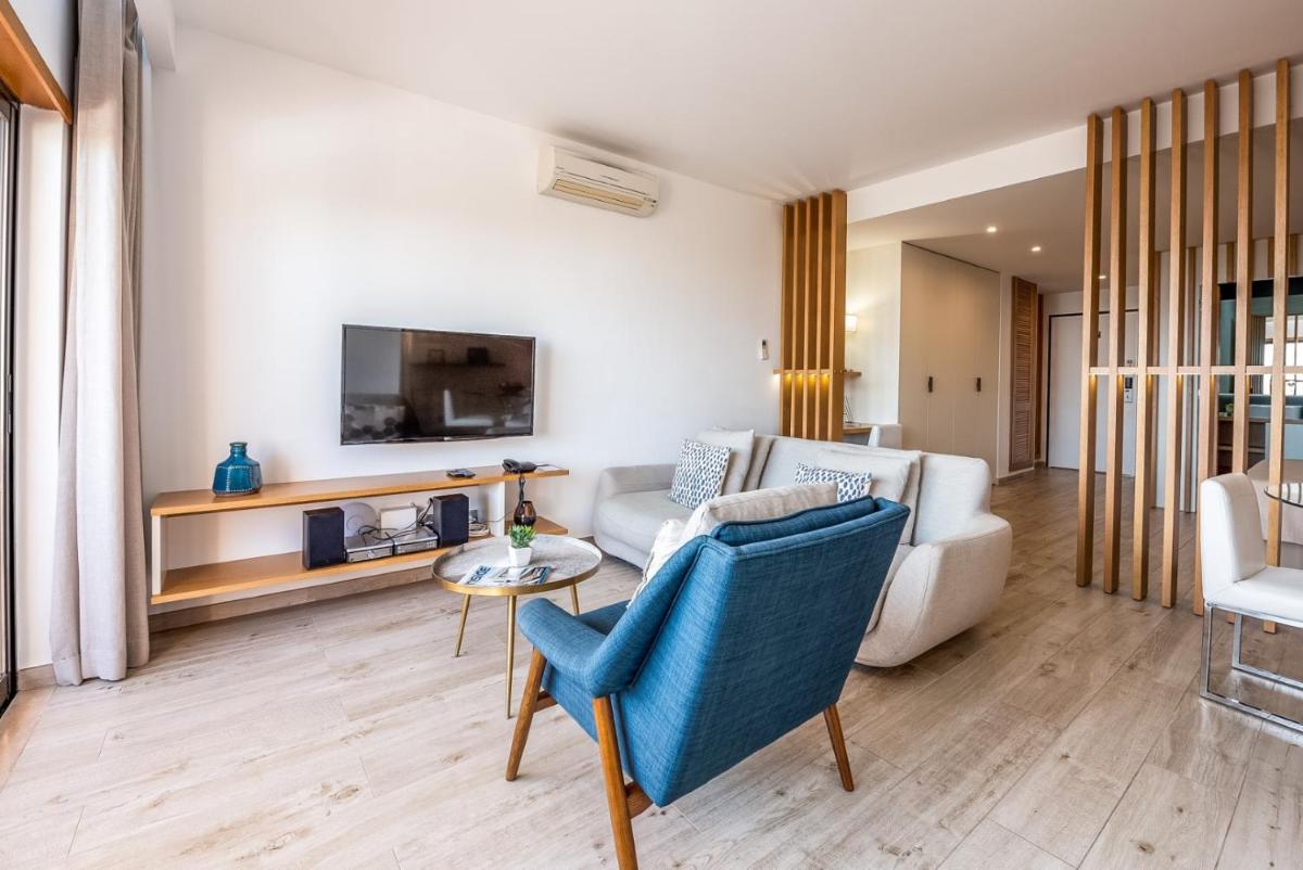 Uma televisão e/ou sistema de entretenimento em Estrela da Luz Resort