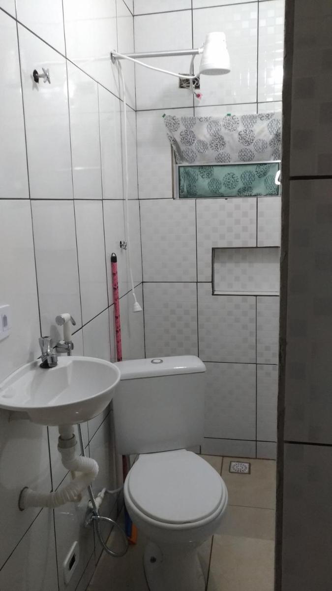HOSTEL família QUARTO PRIVADO próximo aeroporto Int Guarulhos SP TÁXI 24 horas - Housity