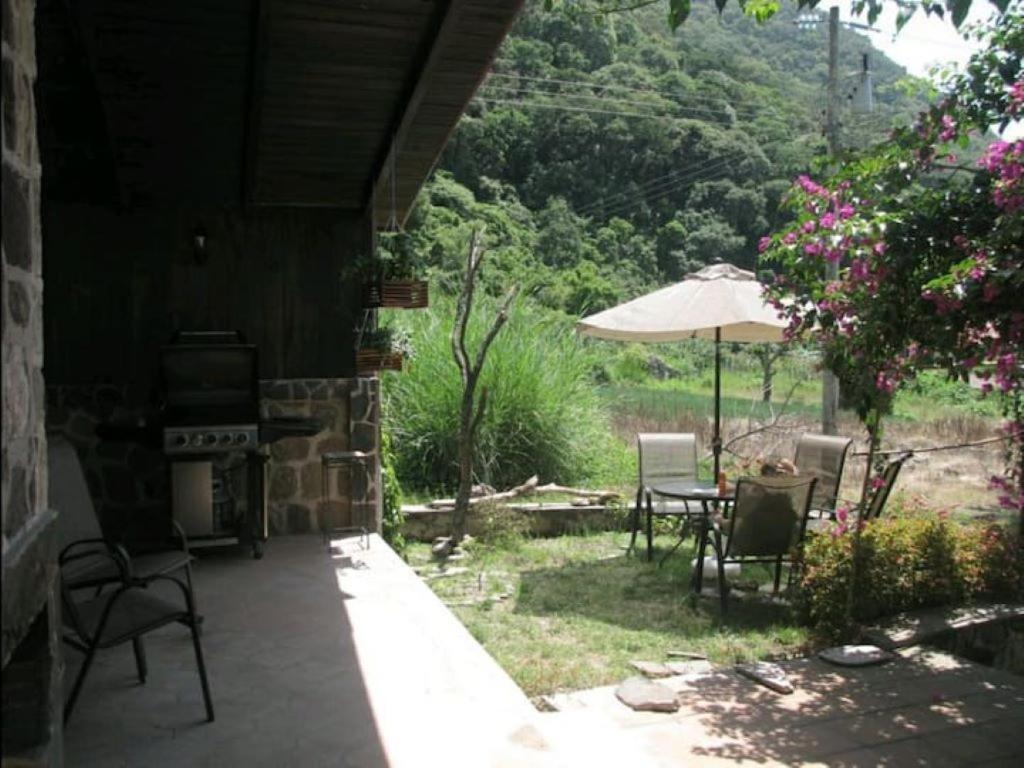 Suitetrails - Casa BuenAventura - Cozy country cottage with wooden ceilings and stone walls within nature reserve