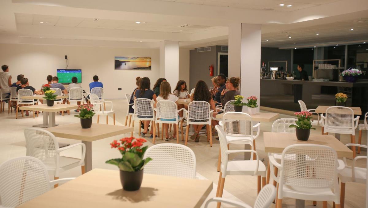 Una televisión o centro de entretenimiento en Hotel Europa Splash & Spa