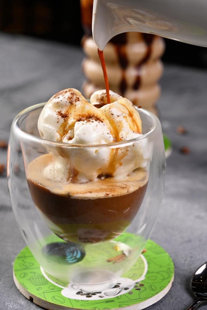 a glass cup filled with chocolate and ice cream at Novotel Kolkata Hotel and Residences in Kolkata a glass cup filled with chocolate and ice cream at Novotel Kolkata Hotel and Residences in Kolkata