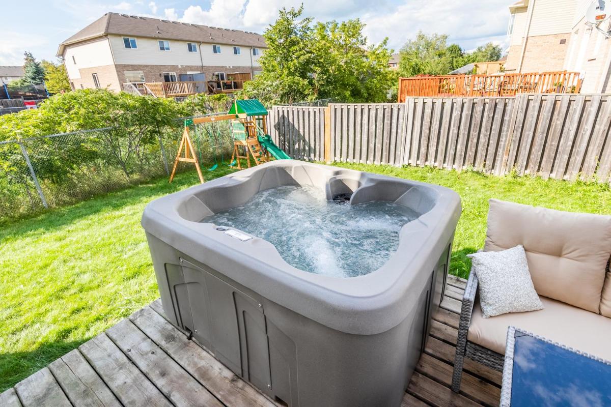 Luxury 3BR 2BA Townhome with Private HOT TUB, Gym, BBQ by GLOBALSTAY - Housity