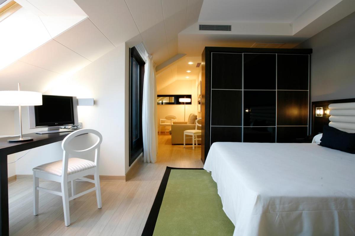 Cama o camas de una habitación en Hotel Bienestar Moaña
