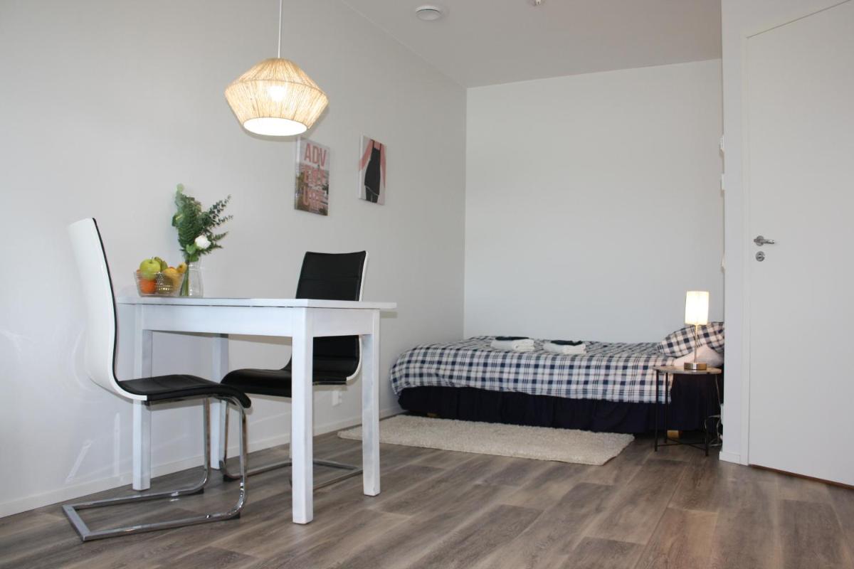 EMMA - New & Modern row house flat in Närpes - 24h Check in - Housity