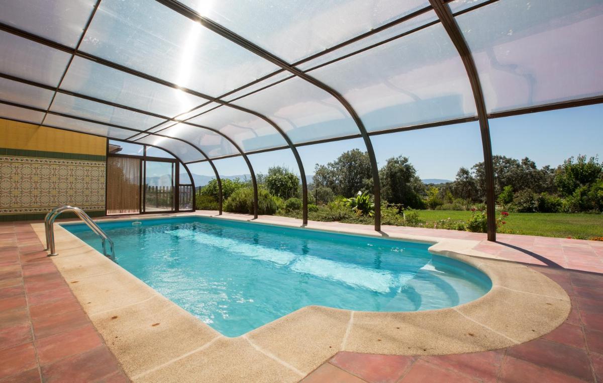 Apartamentos El Jardín del Poeta - Housity