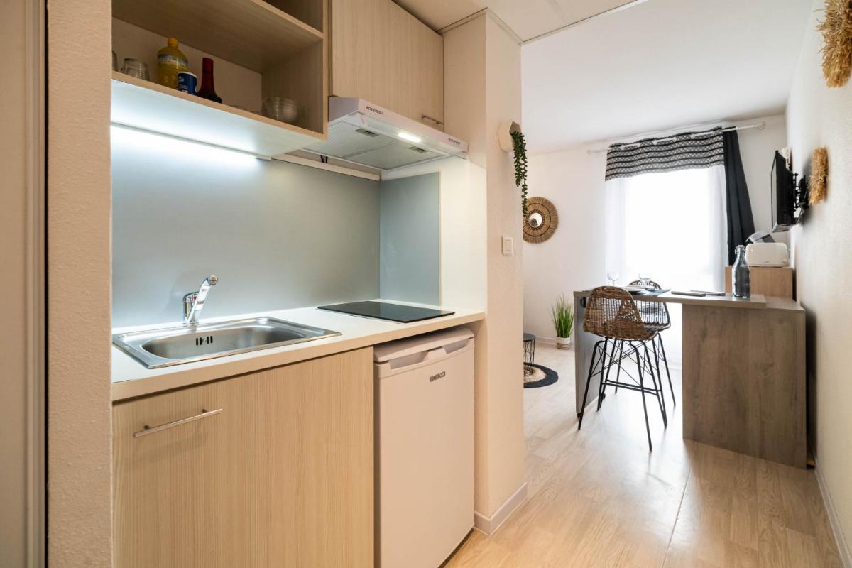 L'ETHNIK--STUDIO TOUT CONFORT--CLIM--PARKING--WIFi - Hizvo