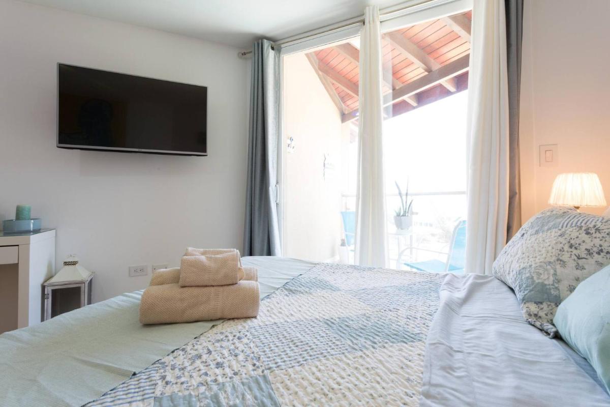 Lovely Sea View,eagle Beach, Wifi - Housity