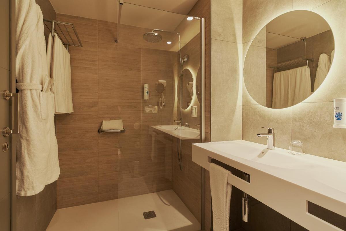 Un baño de Gloria Palace San Agustín Thalasso & Hotel