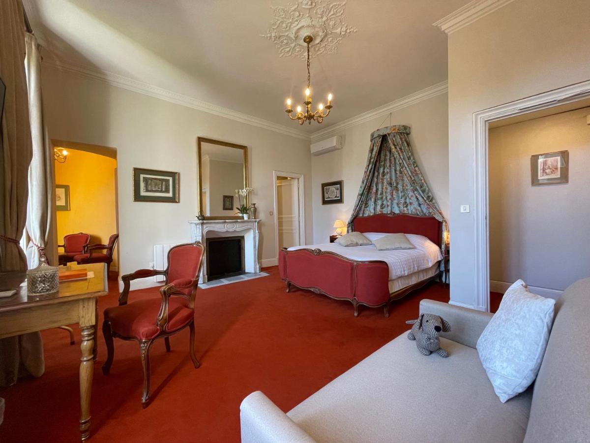 Un ou plusieurs lits dans un hébergement de l'établissement Château Hôtel Edward 1er