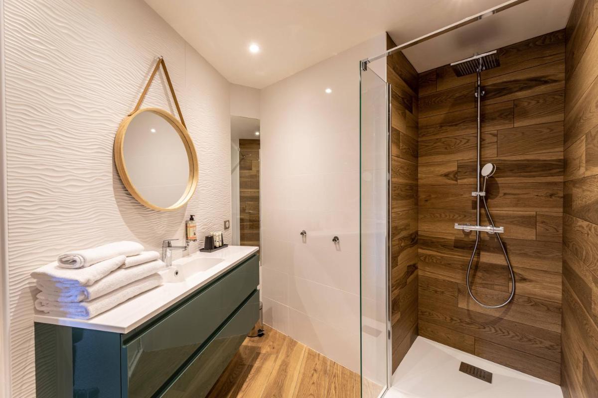 Salle de bains dans l'établissement Le Bailliage Hôtel & Spa