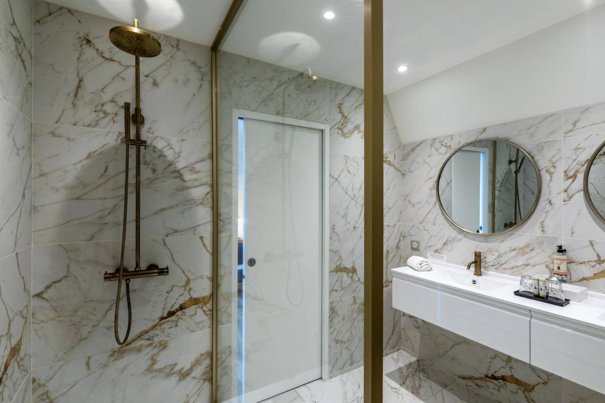 Salle de bains dans l'établissement Le Bailliage Hôtel & Spa
