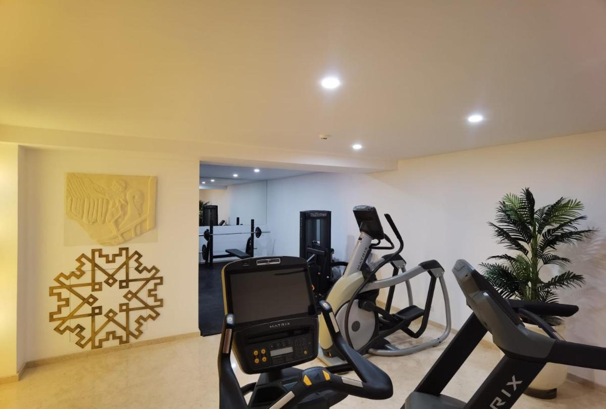 O centro de fitness e/ou as comodidades de fitness de Castelo Hotel