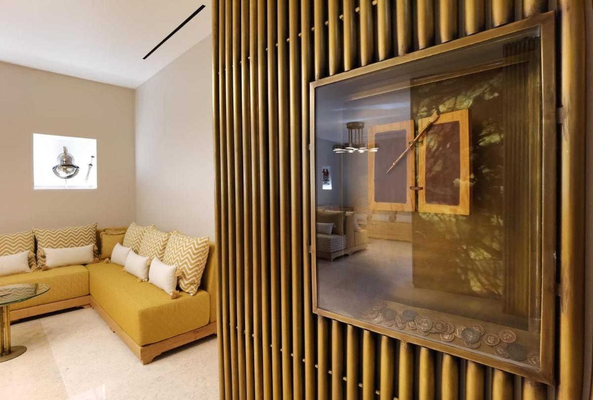 Uma área de estar em Castelo Hotel