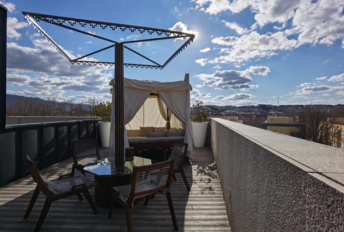 Uma varanda ou terraço em Castelo Hotel