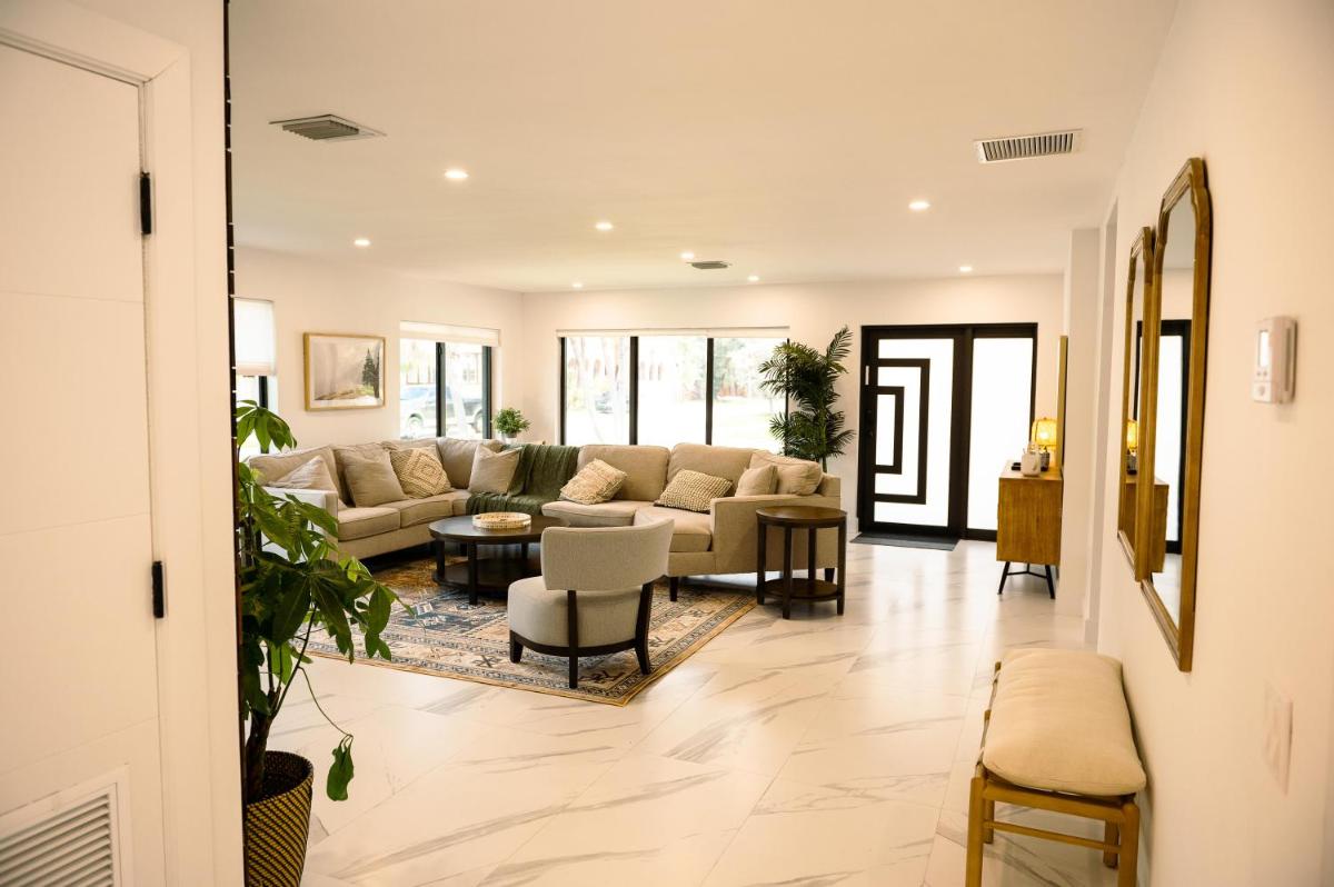 Modern Newly Renovated Boho Beach Home with Heated Pool - Housity