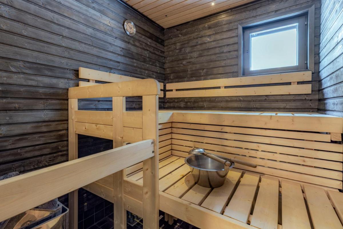 Holiday Apartments Suomu Chalet 14 A & B - Housity