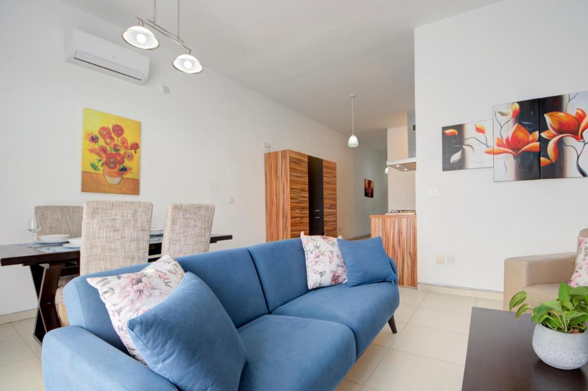 St Julians 2 Bedroom Apartment with Commanding Seaviews by ShortletsMalta - Housity