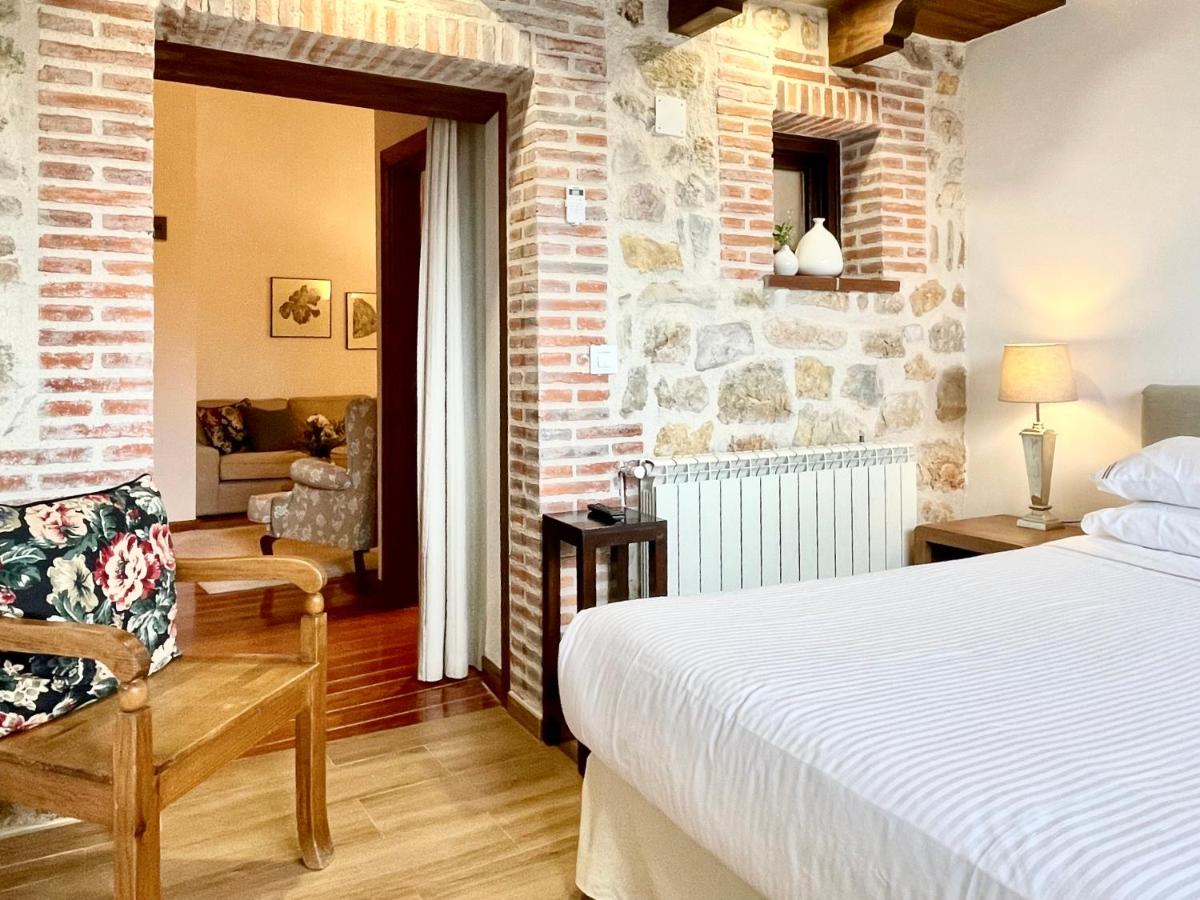Cama o camas de una habitación en Molino de Alcuneza Relais & Châteaux