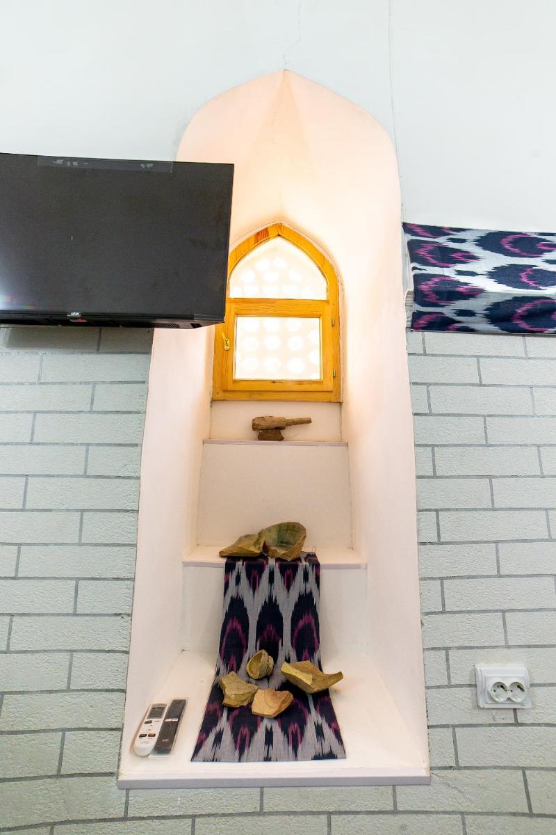 Feruzkhan Hotel - Madrassah Mohammed Rakhim Khan 1871 - Housity