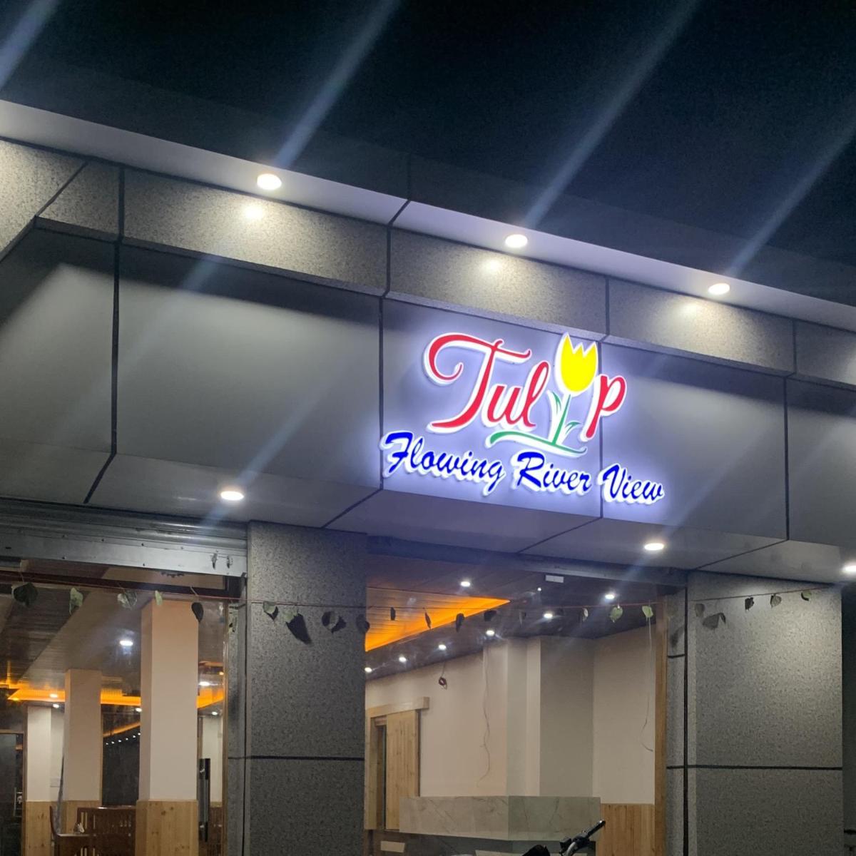 Tulip Flowing River View Hotel. - Housity