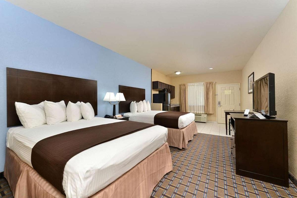 Western Inn & Suites - Housity