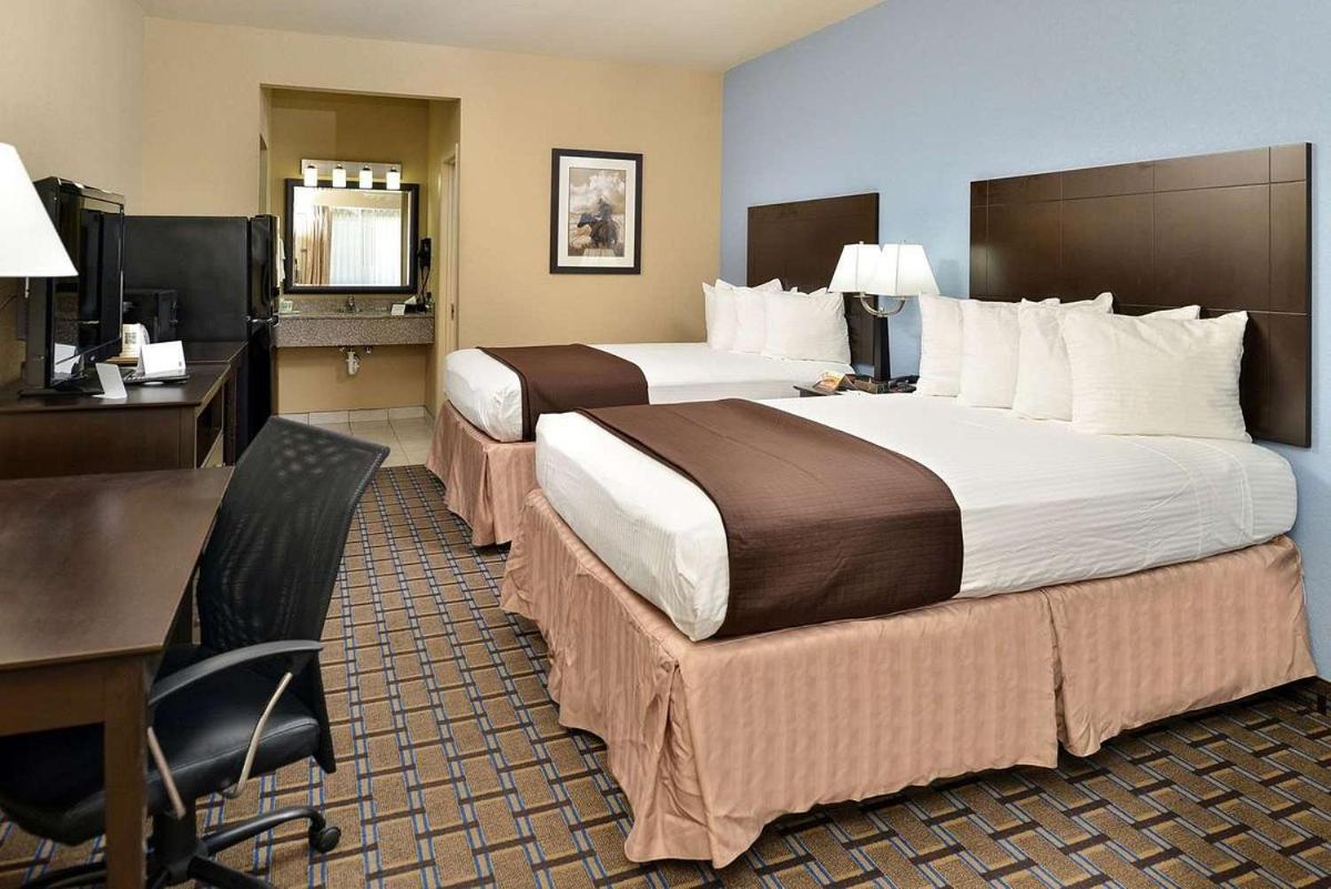 Western Inn & Suites - Housity