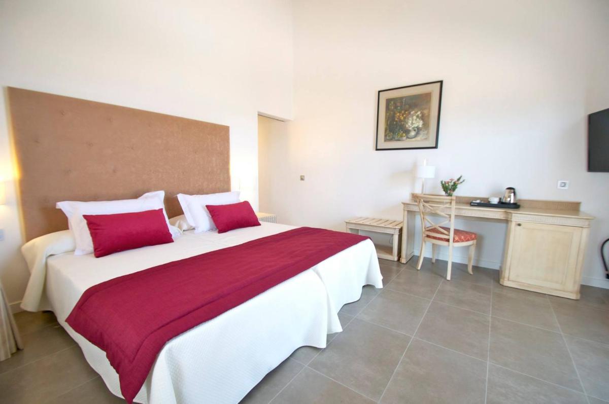 Cama o camas de una habitación en Bennoc Petit Hotel - Only Adults