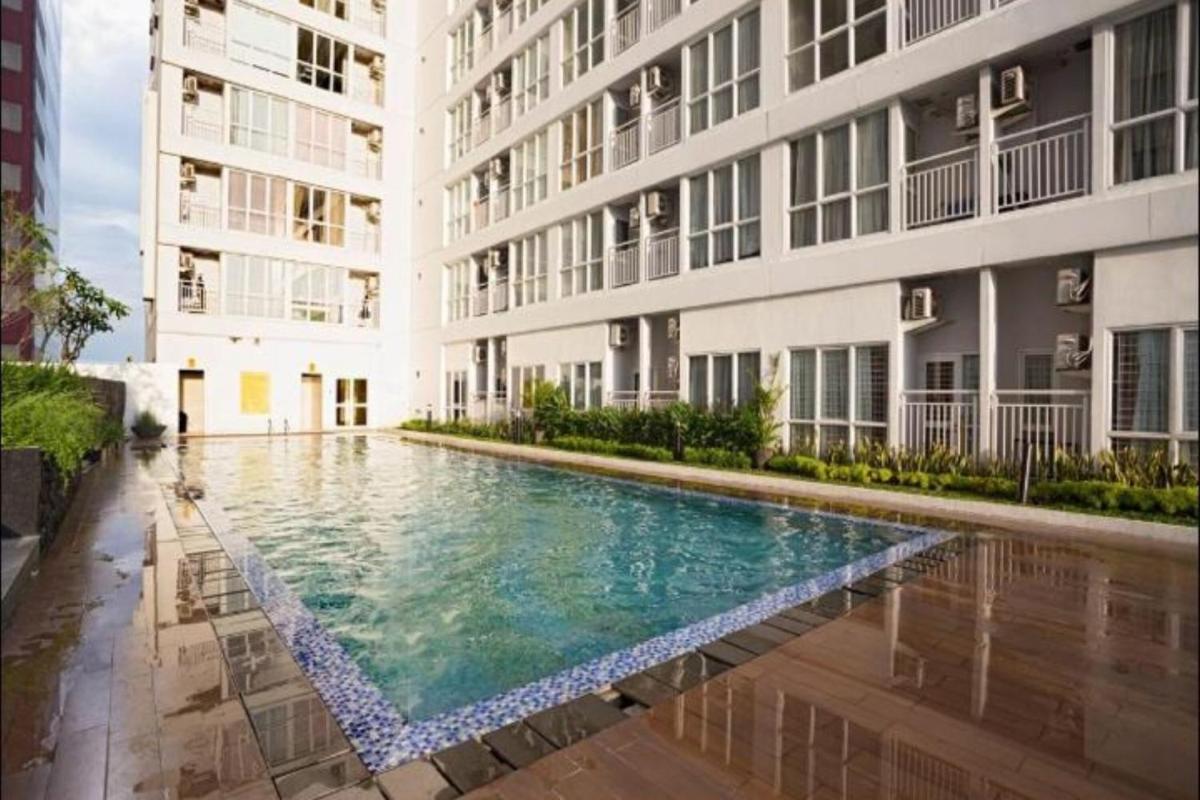 Apartemen Taman Melati Margonda by Winroom - Housity
