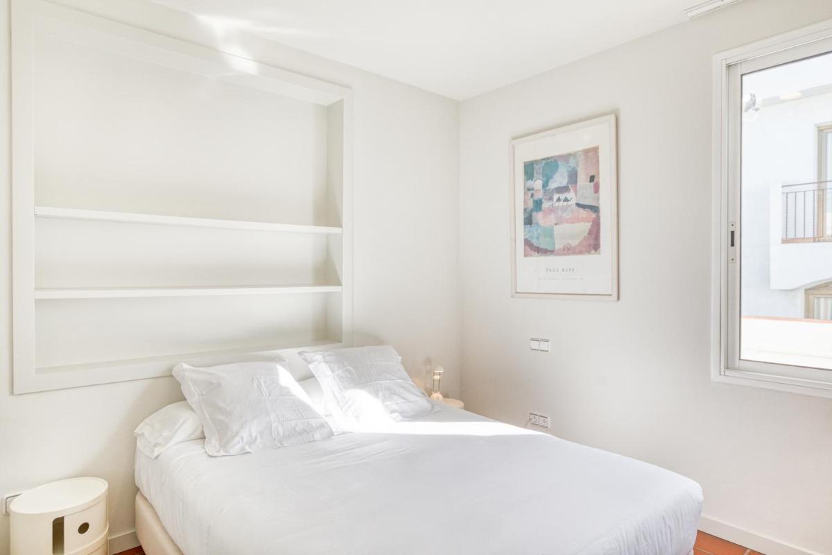 Cama o camas de una habitación en Hotel Marina