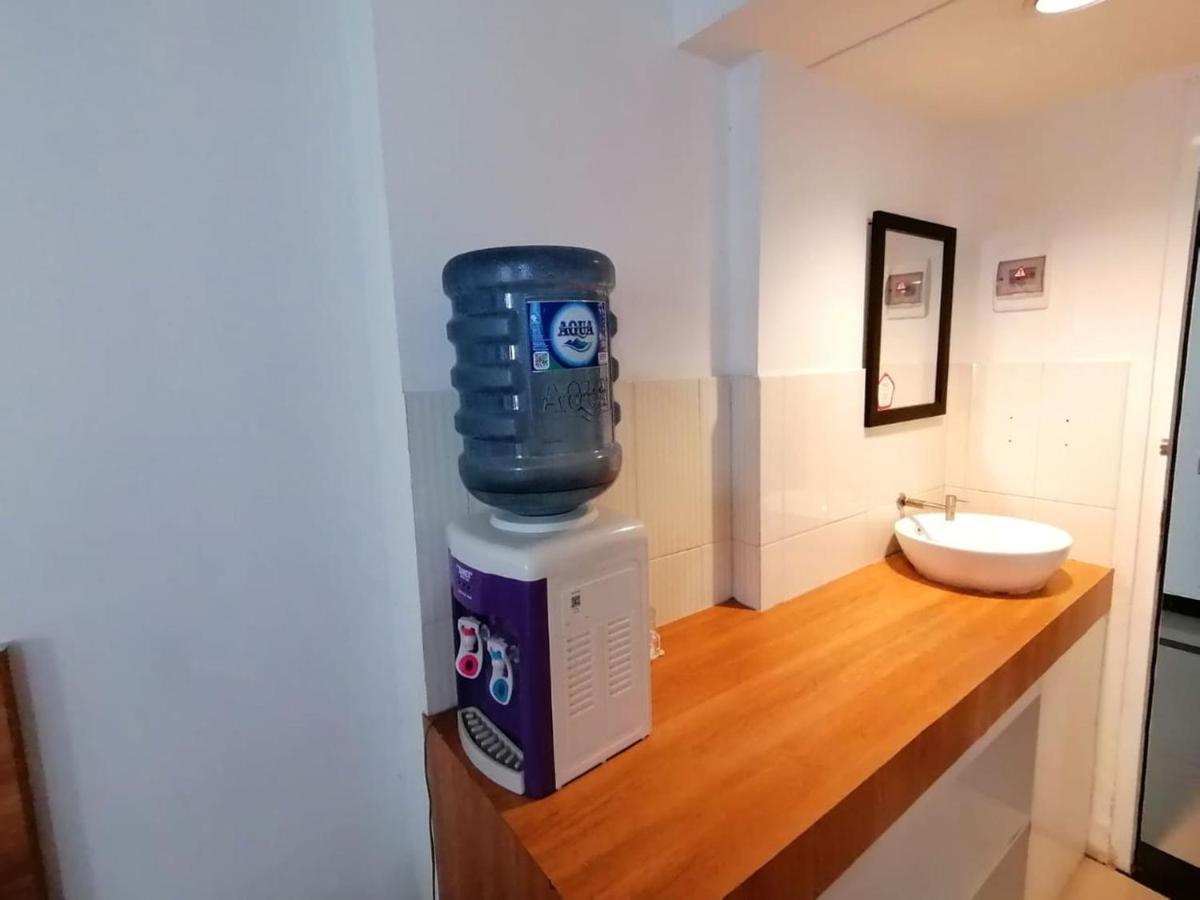 Grand Sentraland Apartment by AT Room - Housity