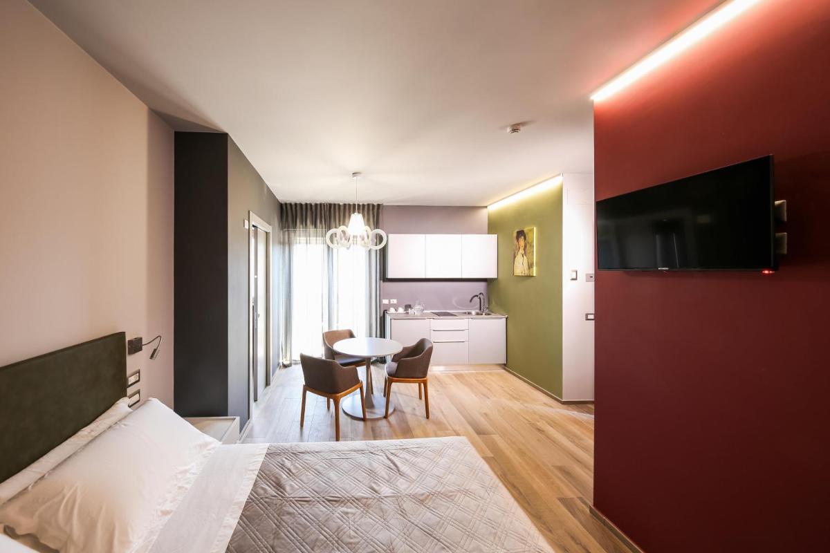 Vicolo Malavolta 7 Rooms and Suites - Housity