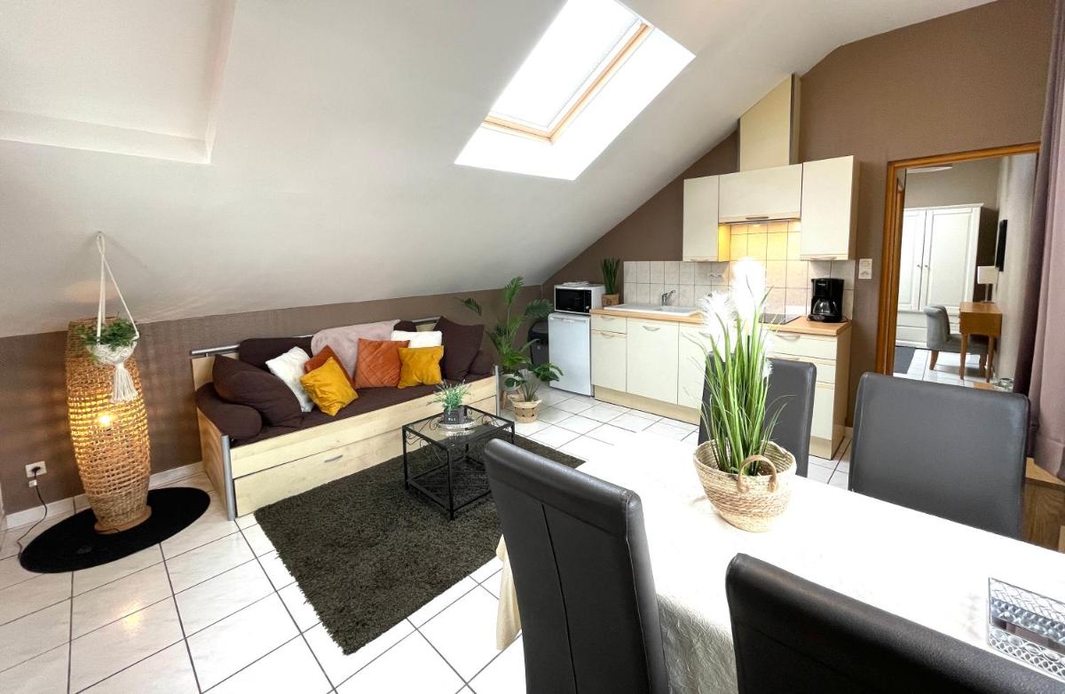 Cuisine ou kitchenette dans l'établissement La Maison Blanche
