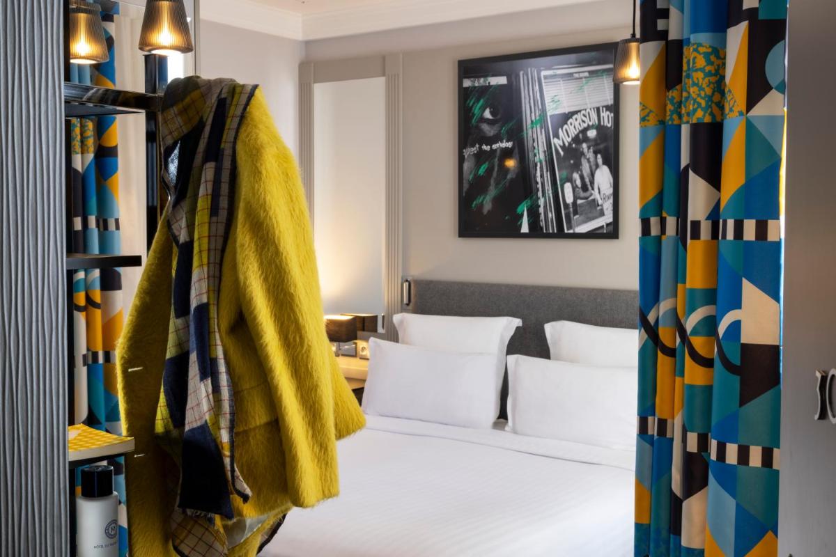 Un ou plusieurs lits dans un hébergement de l'établissement Les Matins de Paris & Spa