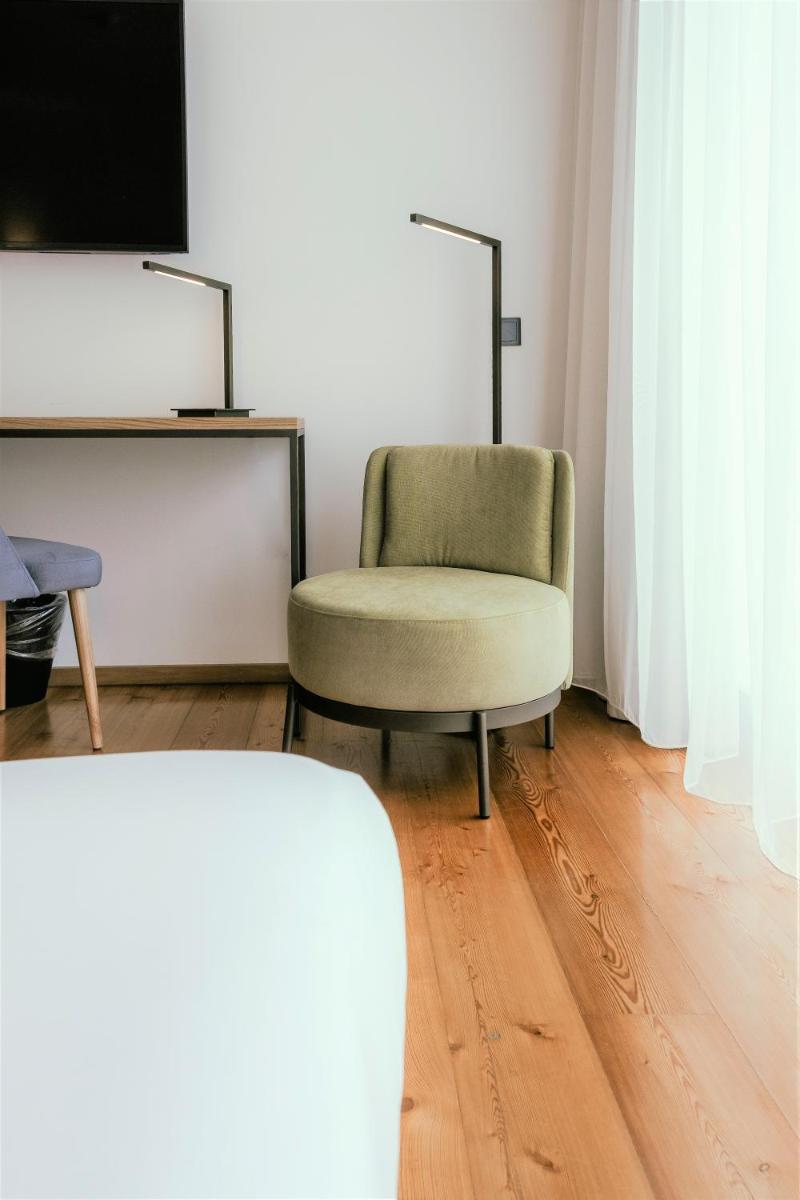 Uma área de estar em Monte Prado Hotel & Spa