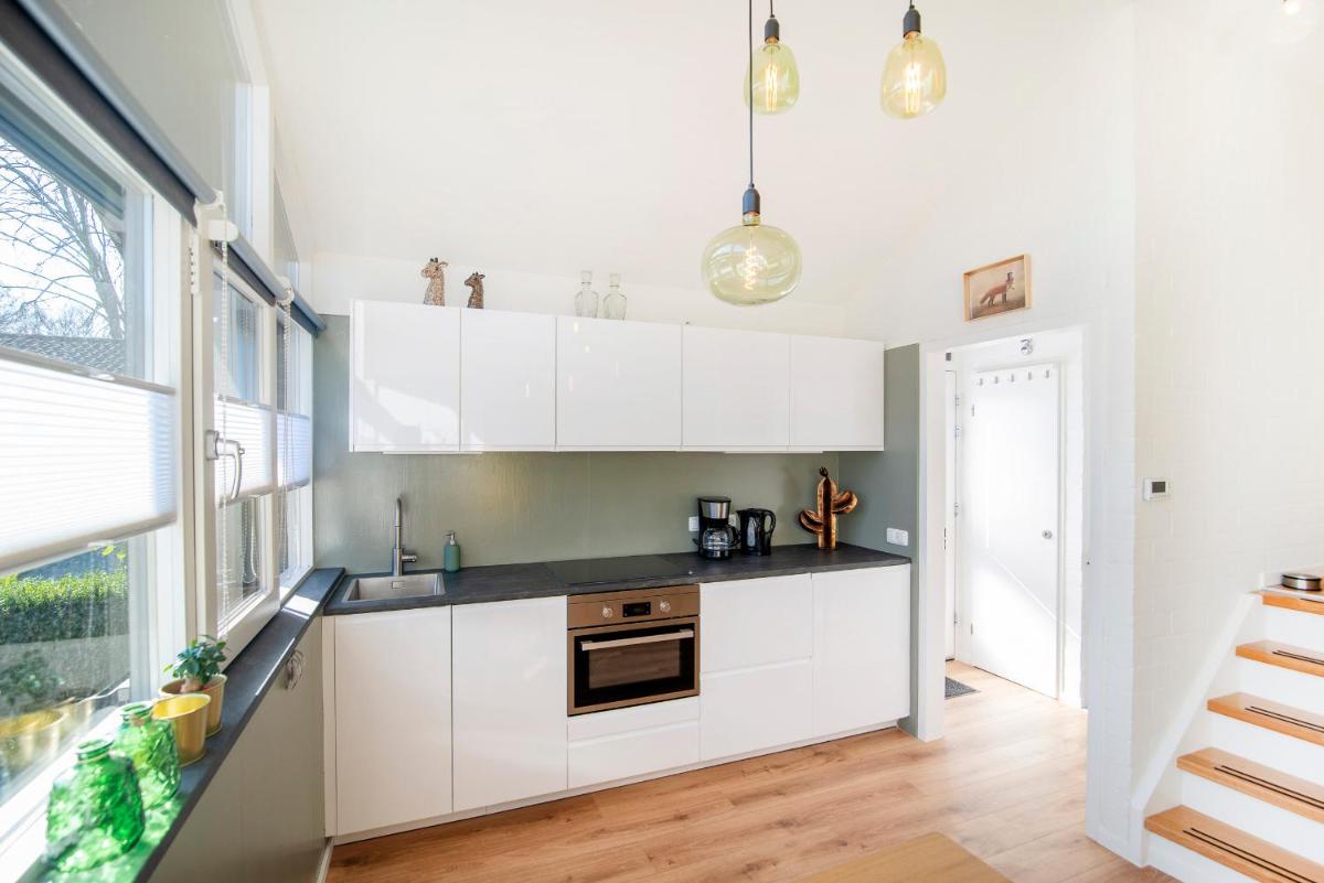 Loohuisje 32 - Housity