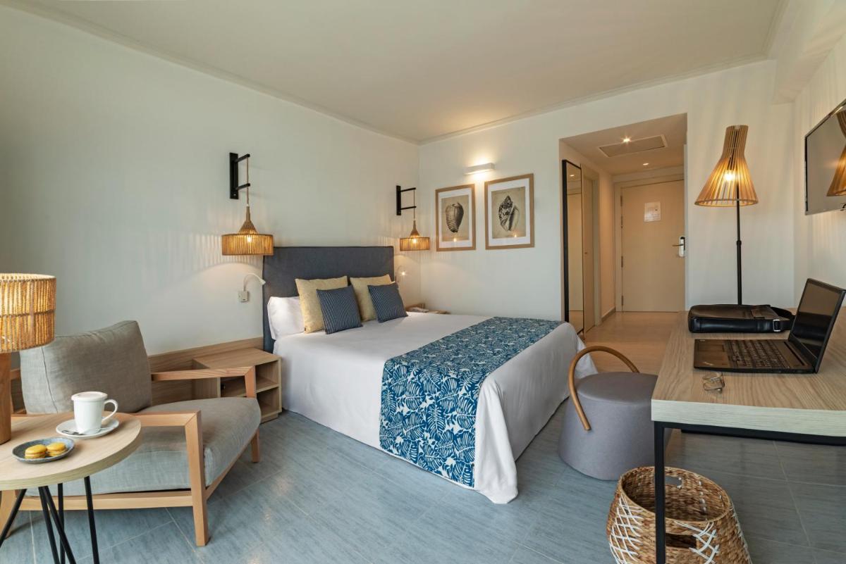 Cama o camas de una habitación en Hotel Cabogata Jardín