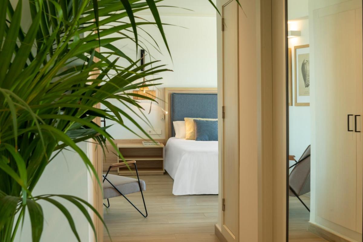 Cama o camas de una habitación en Hotel Cabogata Jardín