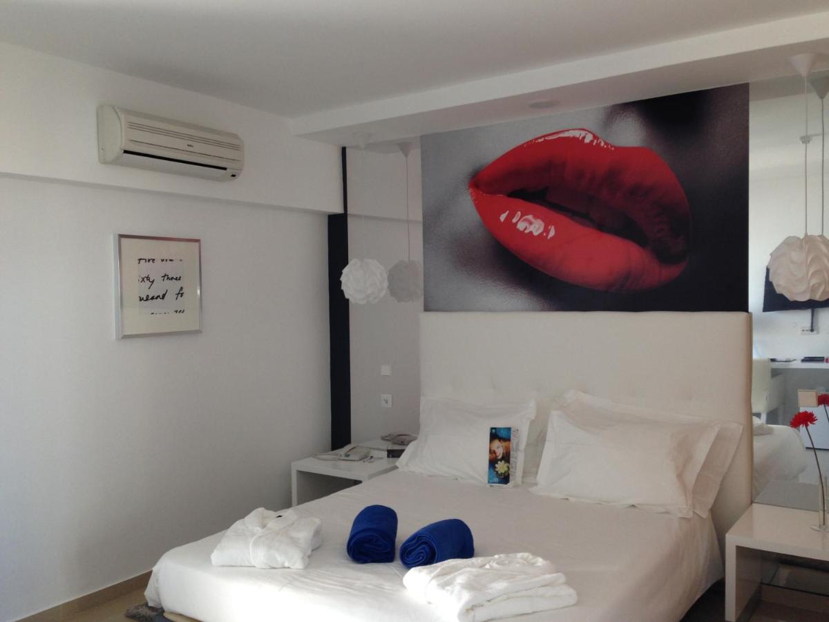 Uma cama ou camas num quarto em Rocamar Exclusive Hotel & Spa - Adults Only