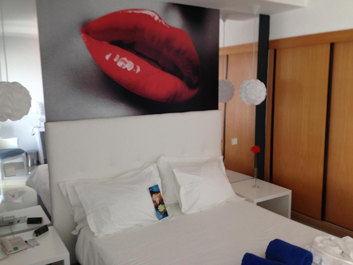 Uma cama ou camas num quarto em Rocamar Exclusive Hotel & Spa - Adults Only