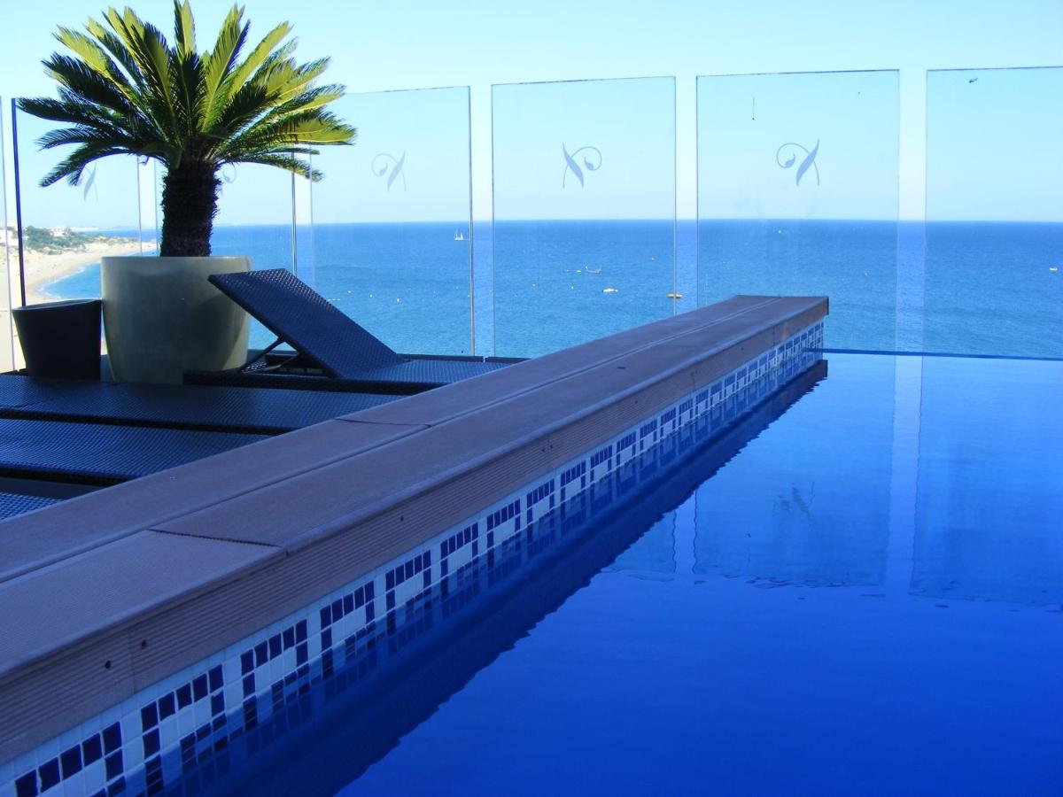 A piscina em ou perto de Rocamar Exclusive Hotel & Spa - Adults Only