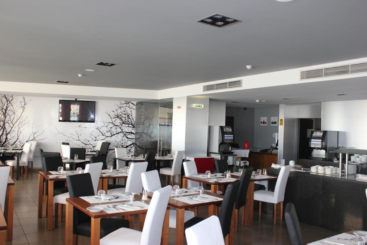 Uma área de estar em Rocamar Exclusive Hotel & Spa - Adults Only