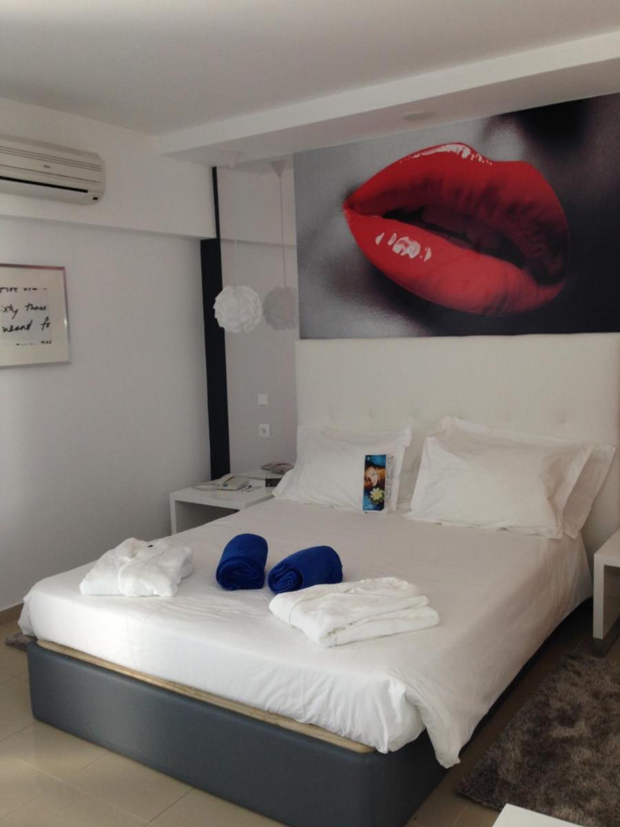 Uma cama ou camas num quarto em Rocamar Exclusive Hotel & Spa - Adults Only