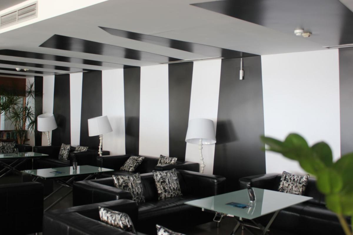 Uma área de estar em Rocamar Exclusive Hotel & Spa - Adults Only