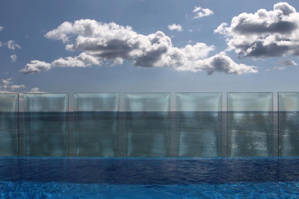 A piscina em ou perto de Rocamar Exclusive Hotel & Spa - Adults Only
