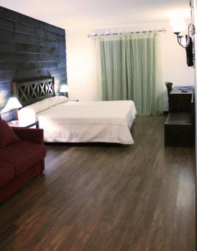 Cama o camas de una habitación en Hotel Spa Villa de Mogarraz