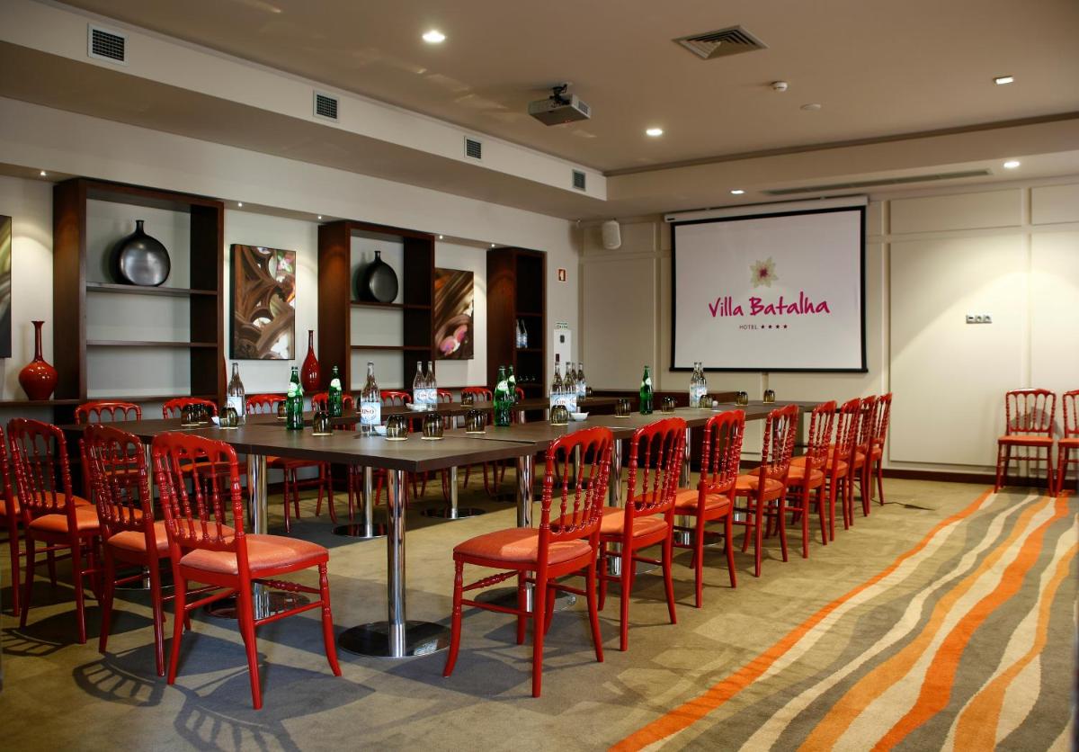 Uma área de estar em Hotel Villa Batalha