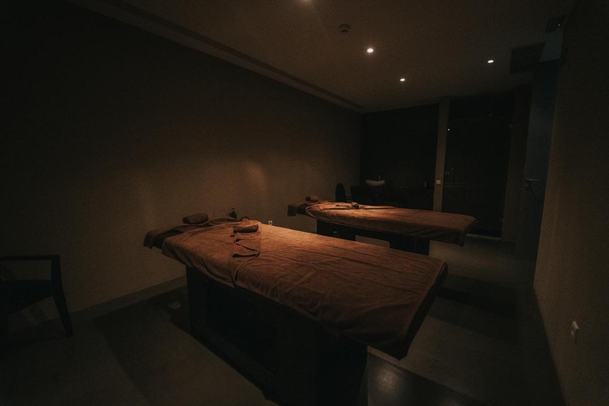 Uma cama ou camas num quarto em Sweet Atlantic Hotel & Spa