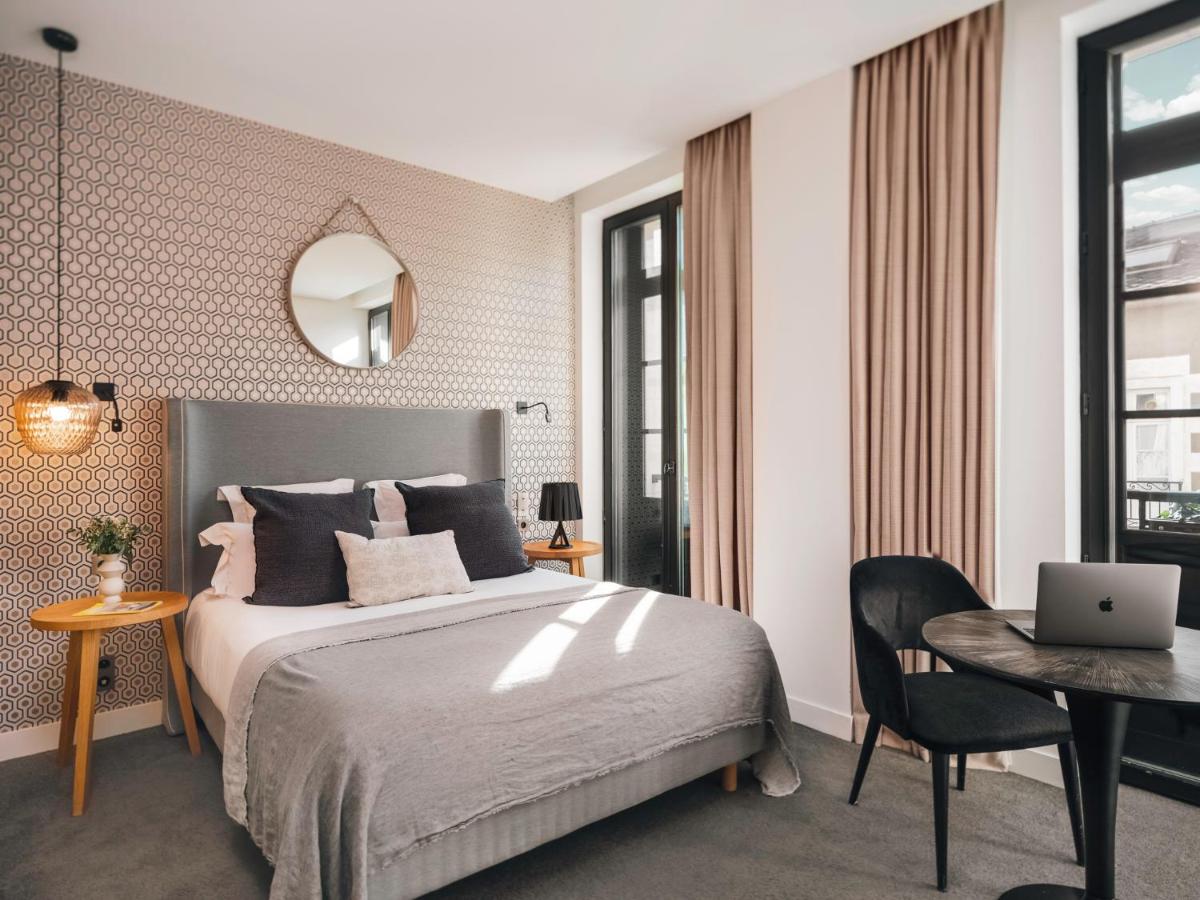 Un ou plusieurs lits dans un hébergement de l'établissement Balthazar Hotel & Spa Rennes - MGallery Collection